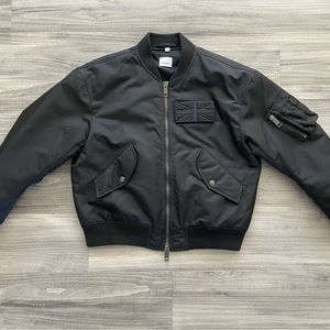 Like new Burberry nylon bomber. Well insulated. Great for a cold day.